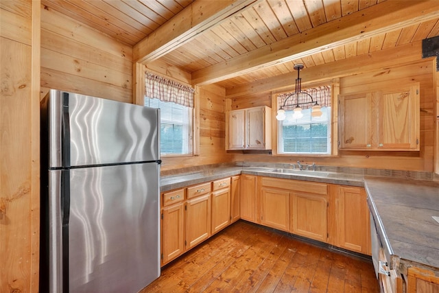 4 Debbie Ct, Chester, NY 10918 - kitchen featuring freestanding refrigerator, a wood ceiling with exposed beams, healthy amount of natural light, light brown cabinets, and wooden walls