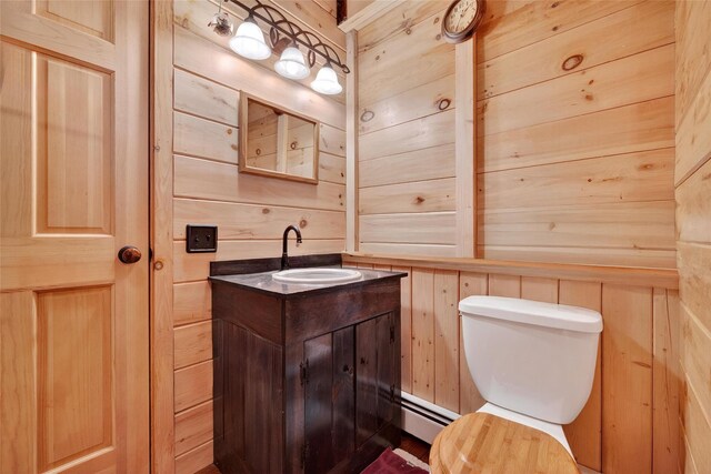 4 Debbie Ct, Chester, NY 10918 - half bathroom with baseboard heating, wooden walls, and vanity