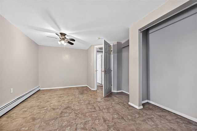 4 Debbie Ct, Chester, NY 10918 - unfurnished bedroom featuring a baseboard radiator, stone finish flooring, and ceiling fan