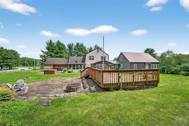4 Debbie Ct, Chester, NY 10918 - back of property featuring an outdoor fire pit, a hot tub, a deck, a patio, and a yard