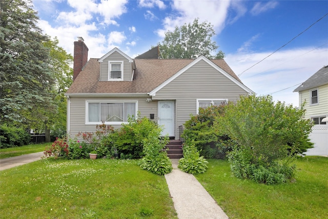 602 Leonard Ave, Uniondale, NY 11553 - new england style home featuring a chimney and a shingled roof