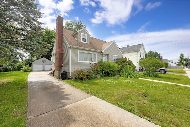 602 Leonard Ave, Uniondale, NY 11553 - view of front of property with a garage, an outbuilding, a front yard, and a chimney