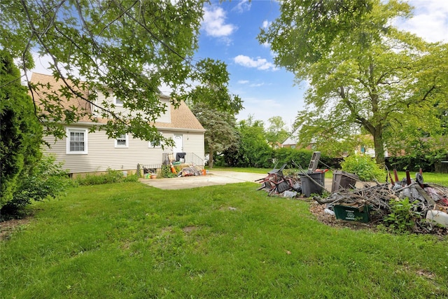 602 Leonard Ave, Uniondale, NY 11553 - view of grassy yard featuring a patio