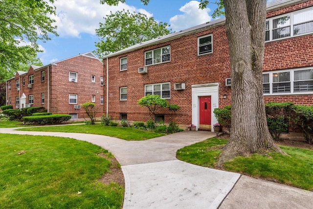 81-29 156th Ave Unit 4, Howard Beach, NY 11414 - view of property with a wall unit AC and cooling unit