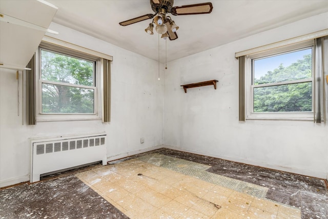 81-29 156th Ave Unit 4, Howard Beach, NY 11414 - empty room with radiator and a ceiling fan