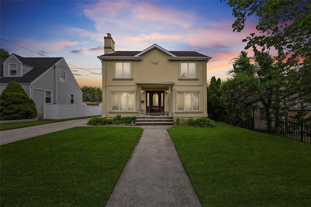 65 Netherwood Dr, Albertson, NY 11507 - traditional-style house with a chimney and stucco siding