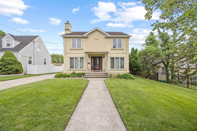 65 Netherwood Dr, Albertson, NY 11507 - view of front of home with a chimney and stucco siding