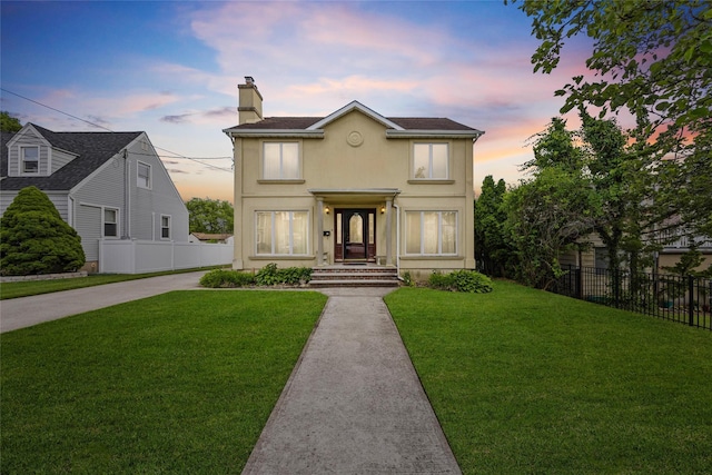 65 Netherwood Dr, Albertson, NY 11507 - view of front facade featuring a chimney and stucco siding