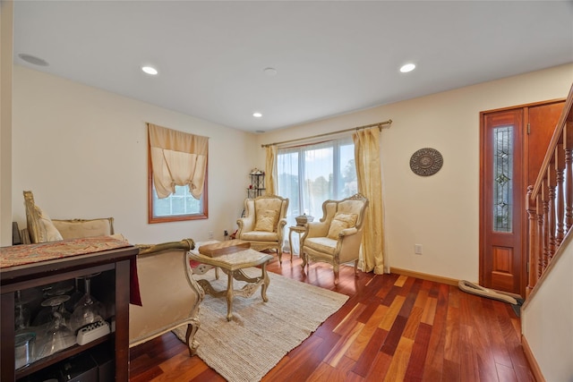 65 Netherwood Dr, Albertson, NY 11507 - living room with wood finished floors, recessed lighting, and stairway
