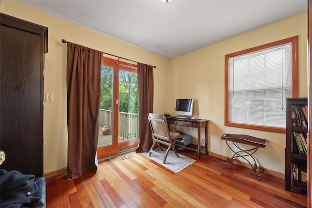 65 Netherwood Dr, Albertson, NY 11507 - home office featuring light wood finished floors and baseboards