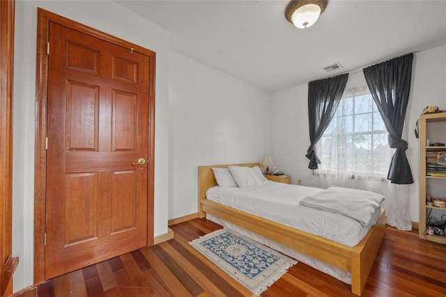 65 Netherwood Dr, Albertson, NY 11507 - bedroom featuring wood finished floors