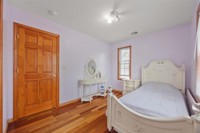 65 Netherwood Dr, Albertson, NY 11507 - bedroom with wood finished floors