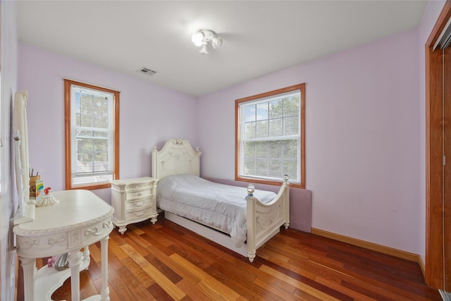 65 Netherwood Dr, Albertson, NY 11507 - bedroom featuring hardwood / wood-style floors