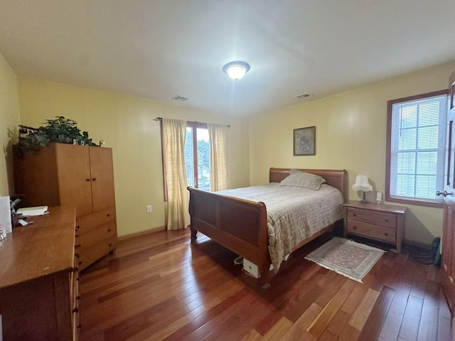 65 Netherwood Dr, Albertson, NY 11507 - bedroom featuring wood-type flooring and baseboards