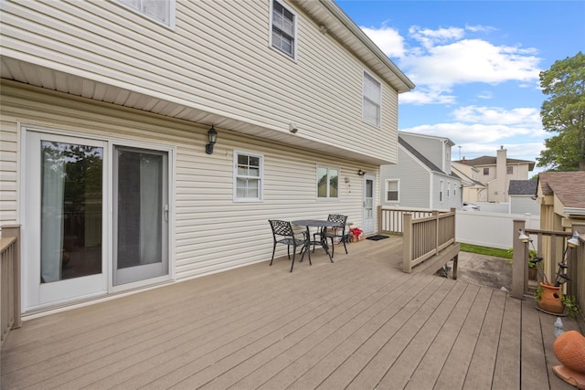 65 Netherwood Dr, Albertson, NY 11507 - wooden deck featuring outdoor dining area