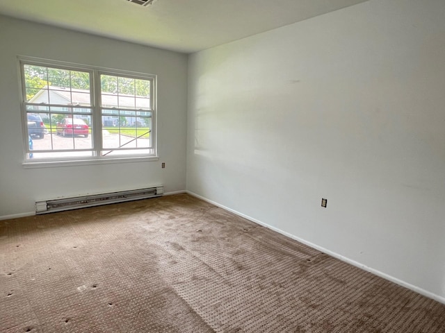 42D Trent Ct Unit 42D, Ridge, NY 11961 - carpeted empty room featuring a baseboard radiator and baseboards