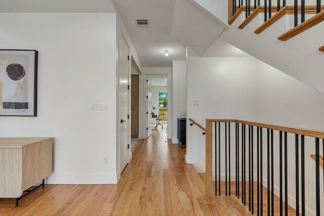 17 Union Rd Unit 208, Spring Valley, NY 10977 - hallway with an upstairs landing and light wood-style floors