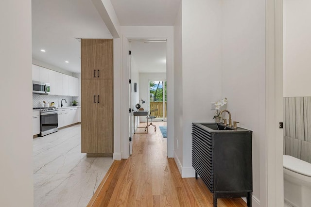 17 Union Rd Unit 208, Spring Valley, NY 10977 - hall featuring a sink and recessed lighting