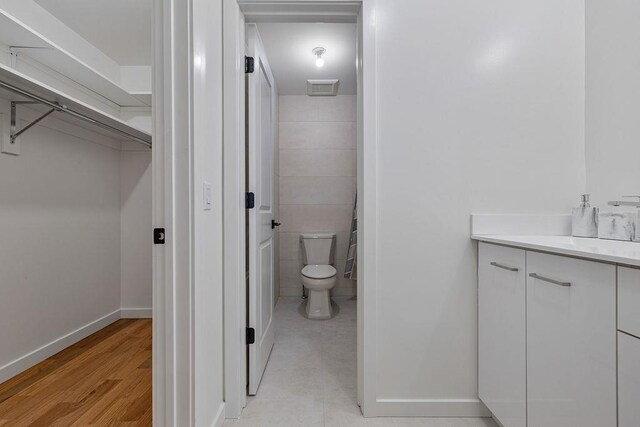 17 Union Rd Unit 208, Spring Valley, NY 10977 - bathroom with vanity, tile walls, and wood finished floors