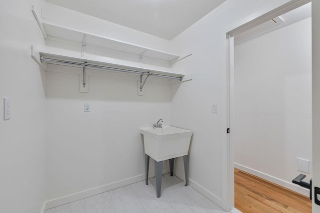 17 Union Rd Unit 208, Spring Valley, NY 10977 - laundry area featuring baseboards