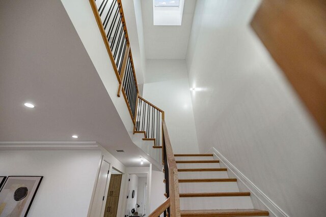 17 Union Rd Unit 208, Spring Valley, NY 10977 - staircase with a towering ceiling and recessed lighting