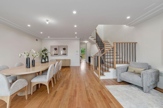 17 Union Rd Unit 208, Spring Valley, NY 10977 - dining space featuring stairs, light wood-style floors, recessed lighting, radiator, and ornamental molding