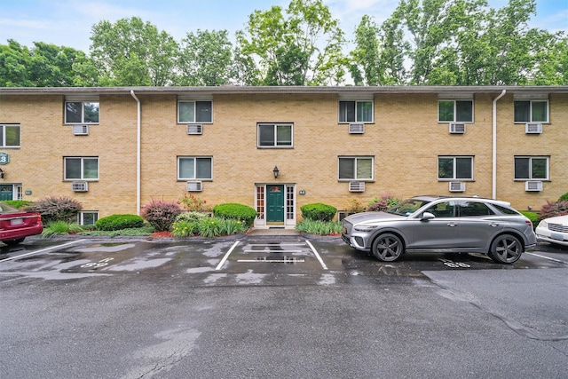 13 Scenic Dr Unit M, Croton-On-Hudson, NY 10520 - view of property featuring uncovered parking and cooling unit