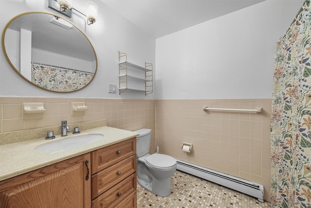 13 Scenic Dr Unit M, Croton-On-Hudson, NY 10520 - full bath featuring a baseboard heating unit, tile walls, vanity, wainscoting, and tile patterned flooring