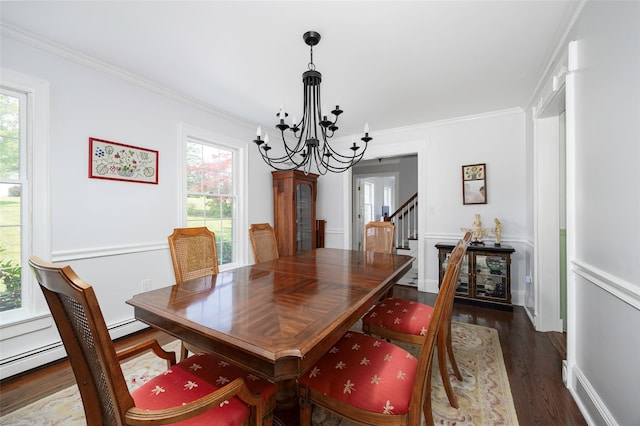 4 Tower Rd, Hopewell Junction, NY 12533 - dining area with a chandelier, crown molding, stairway, wood finished floors, and wainscoting