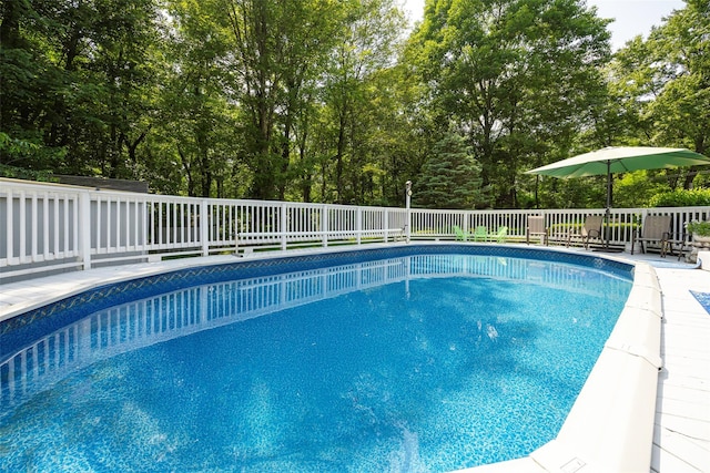 4 Tower Rd, Hopewell Junction, NY 12533 - view of swimming pool with view of scattered trees