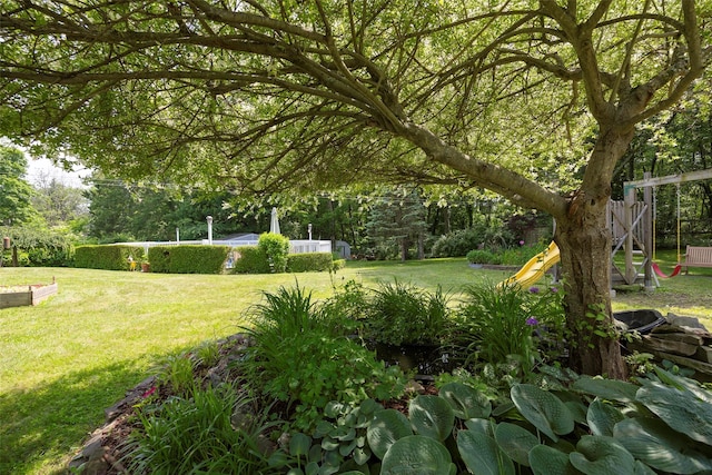 4 Tower Rd, Hopewell Junction, NY 12533 - view of green lawn featuring a playground