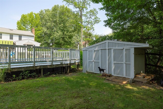 4 Tower Rd, Hopewell Junction, NY 12533 - view of green lawn featuring a storage shed and a wooden deck