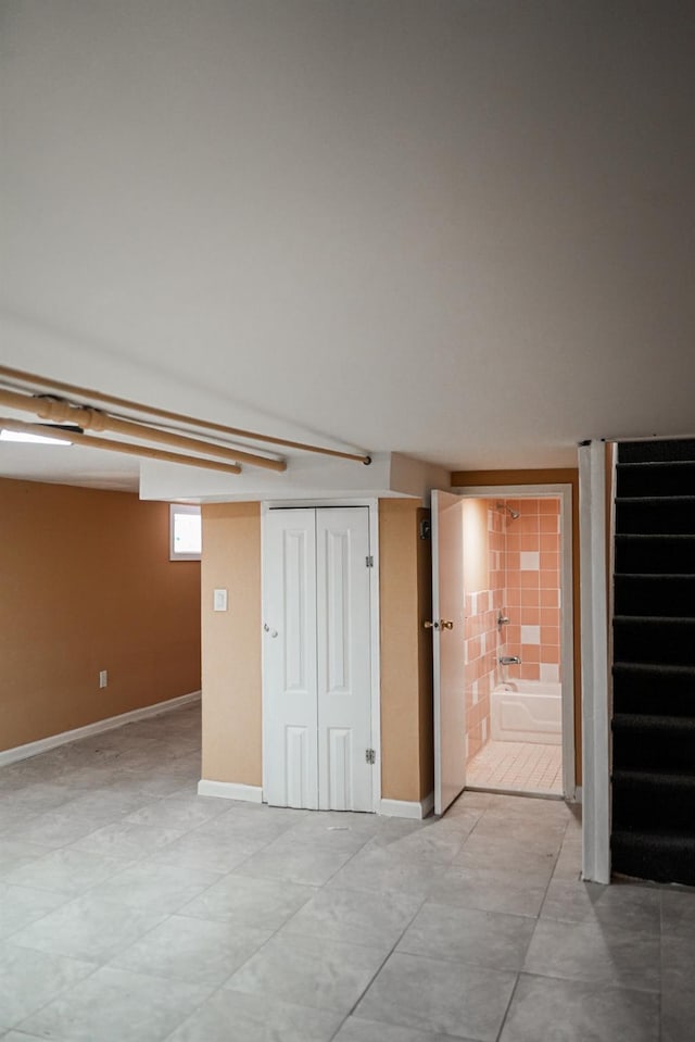8620 130th St, Richmond Hill, NY 11418 - unfurnished room with stairway and light tile patterned flooring