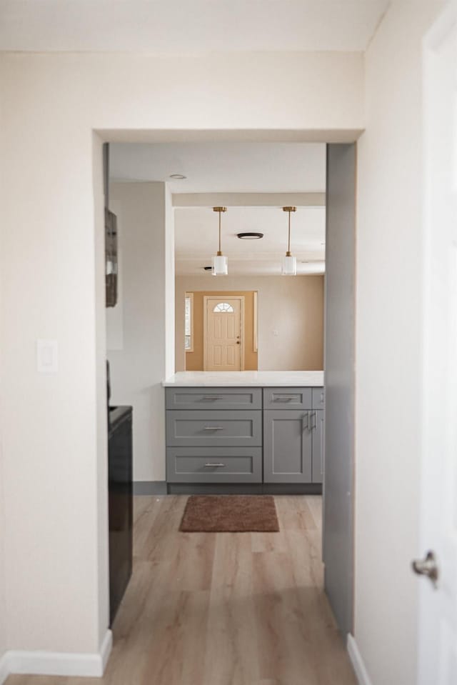 8620 130th St, Richmond Hill, NY 11418 - hall featuring light wood-style flooring and baseboards