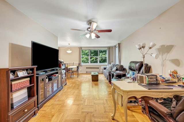 98 Dehaven Dr Unit 1F, Yonkers, NY 10703 - living room featuring radiator and a ceiling fan
