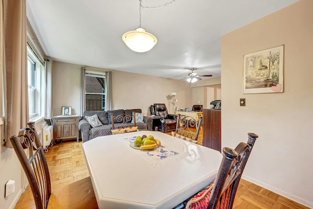 98 Dehaven Dr Unit 1F, Yonkers, NY 10703 - dining space featuring a ceiling fan and baseboards