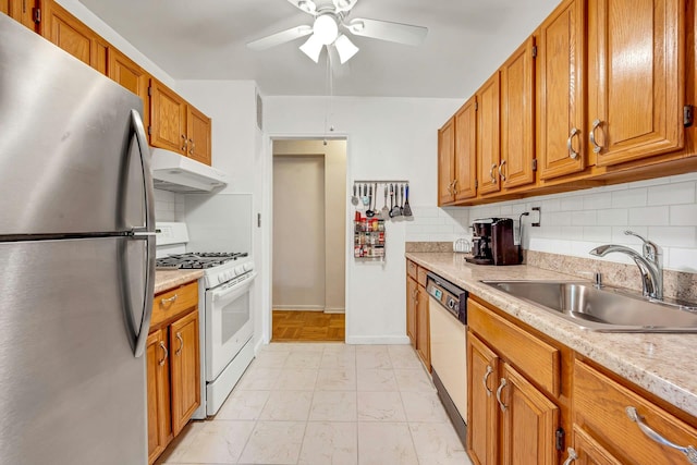98 Dehaven Dr Unit 1F, Yonkers, NY 10703 - kitchen featuring white appliances, under cabinet range hood, light countertops, and decorative backsplash