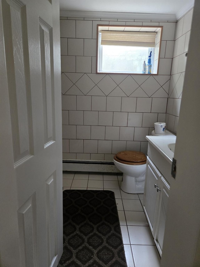 1206 August Rd, North Babylon, NY 11703 - bathroom featuring vanity, tile patterned floors, and baseboard heating