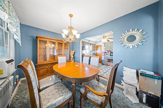 94 Shaw Ave, Valley Stream, NY 11580 - dining space with a chandelier, carpet, and ceiling fan