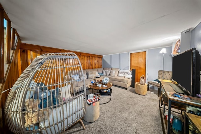 94 Shaw Ave, Valley Stream, NY 11580 - living area featuring carpet floors and wood walls