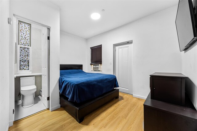 62 Buchanan Pl, Bronx, NY 10453 - bedroom with light wood-style flooring and cooling unit