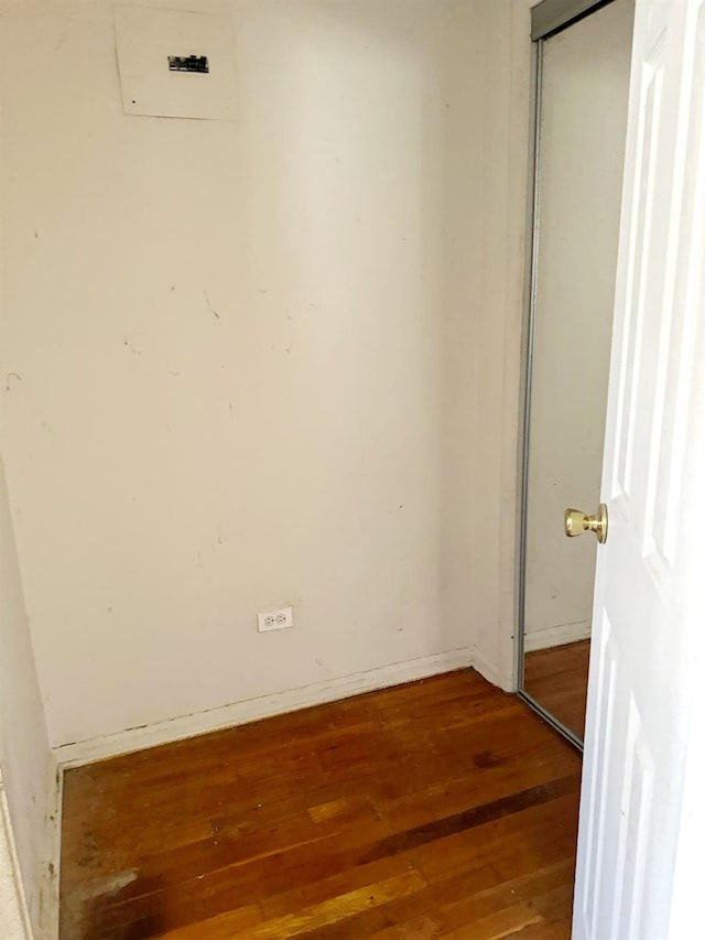 83-83 118th St Unit 6L, Kew Gardens, NY 11415 - unfurnished room with hardwood / wood-style flooring and baseboards