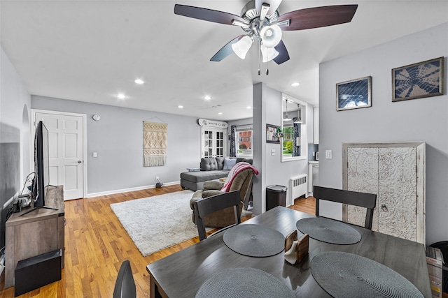 1879 Crompond Rd Unit E16, Peekskill, NY 10566 - dining room with radiator, a ceiling fan, light wood-type flooring, and recessed lighting