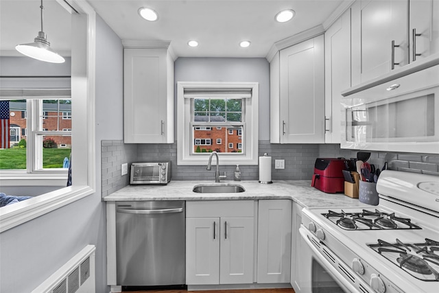 1879 Crompond Rd Unit E16, Peekskill, NY 10566 - kitchen featuring white appliances, white cabinetry, backsplash, and recessed lighting