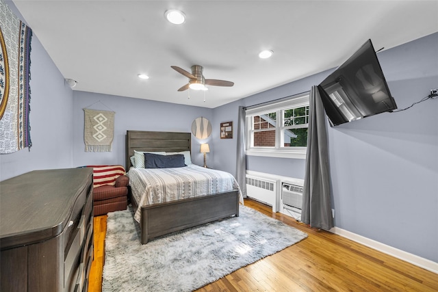 1879 Crompond Rd Unit E16, Peekskill, NY 10566 - bedroom with radiator heating unit, wood finished floors, recessed lighting, and ceiling fan