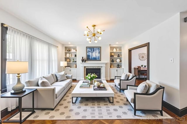 11467 202nd St, Saint Albans, NY 11412 - living area featuring a chandelier, a fireplace, and built in shelves