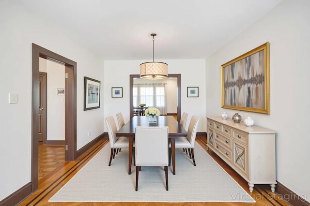 11467 202nd St, Saint Albans, NY 11412 - dining area with wood finished floors and baseboards
