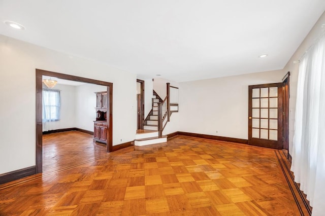 11467 202nd St, Saint Albans, NY 11412 - spare room with stairs, a baseboard heating unit, and recessed lighting