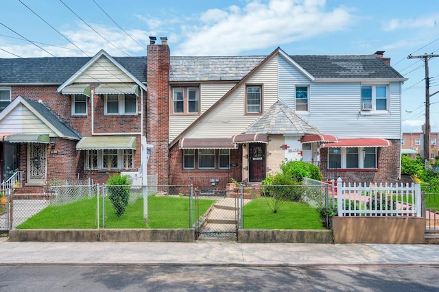 11467 202nd St, Saint Albans, NY 11412 - view of front facade with a chimney, brick siding, a fenced front yard, a gate, and entry steps