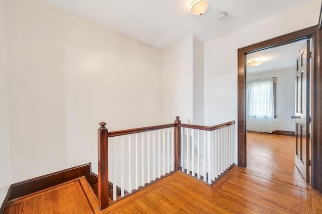 11467 202nd St, Saint Albans, NY 11412 - stairs featuring wood finished floors and baseboards